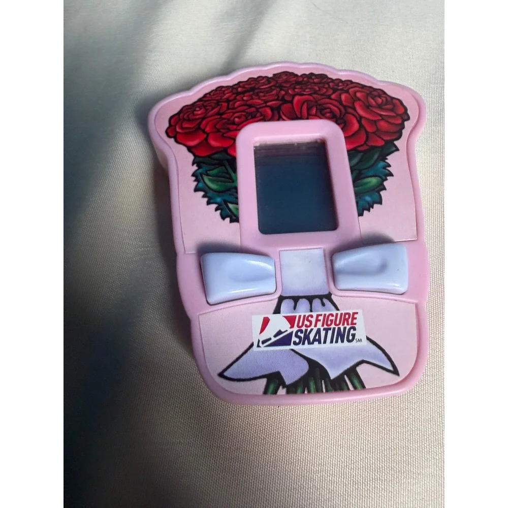 Vintage 2005 Burger King US Figure Skating Handheld Electronic Game Roses works
